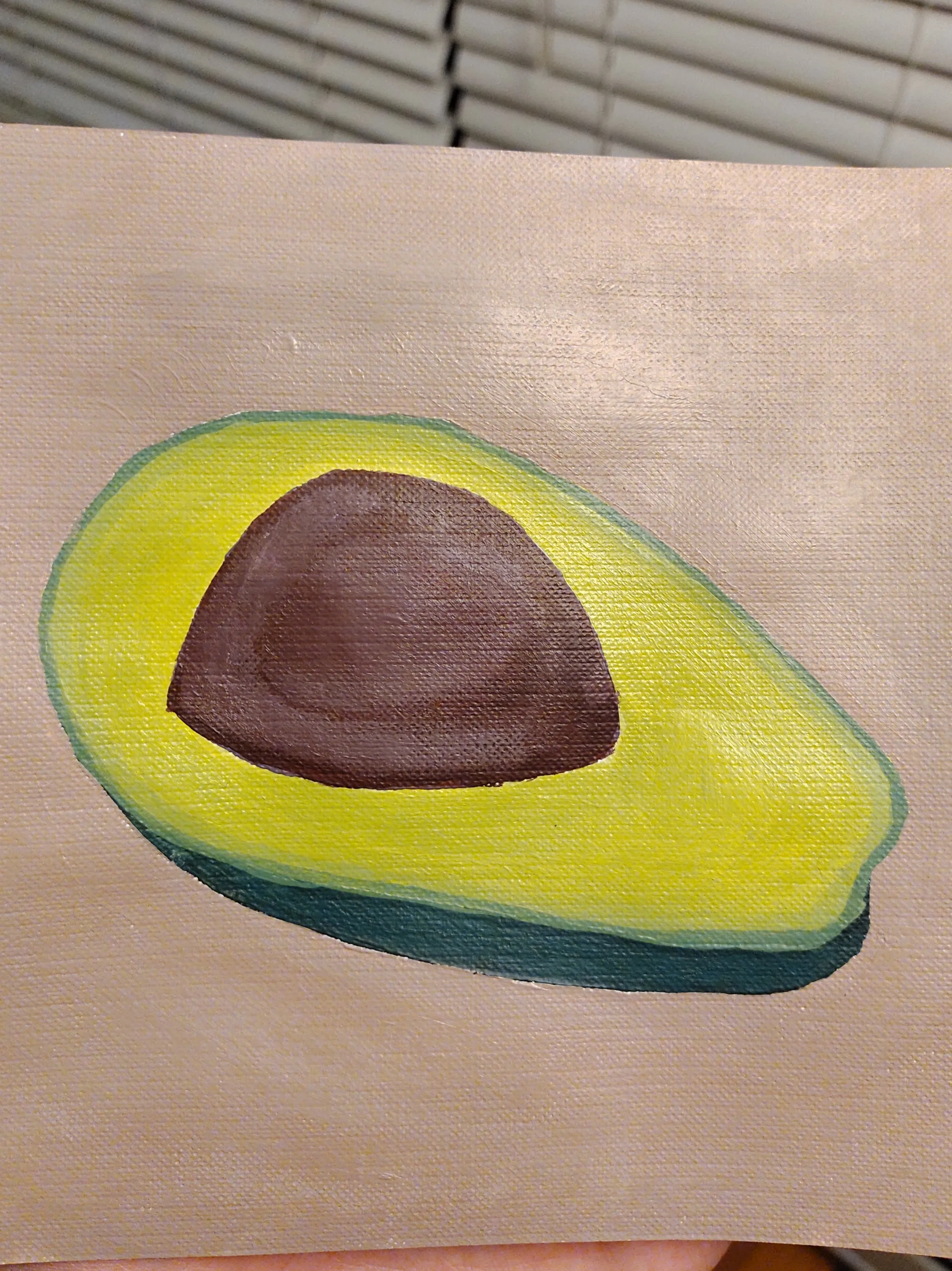 An avocado Kevin painted